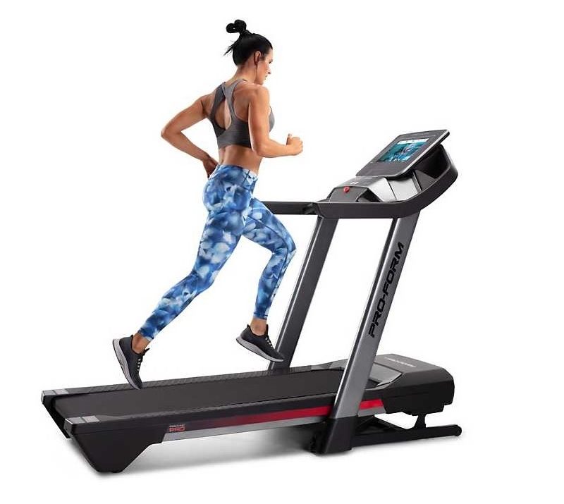 ProForm Pro 5000 Treadmill with runner using it.