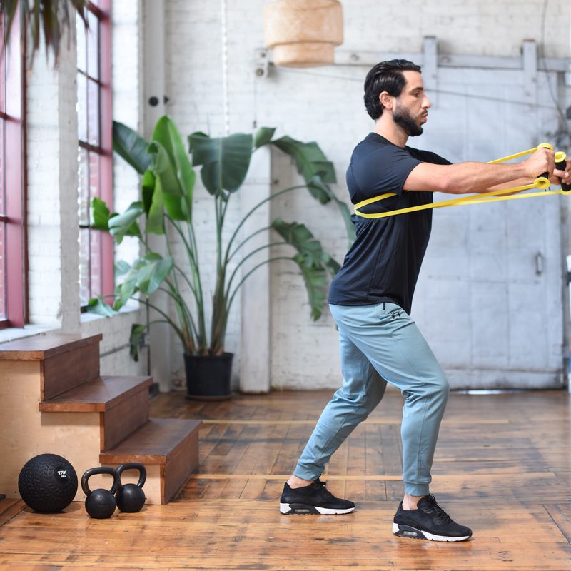 TRX Bandit pro lifestyle image white indoor house/home gym TRX Bandit pro lifestyle image white indoor house/home gym.