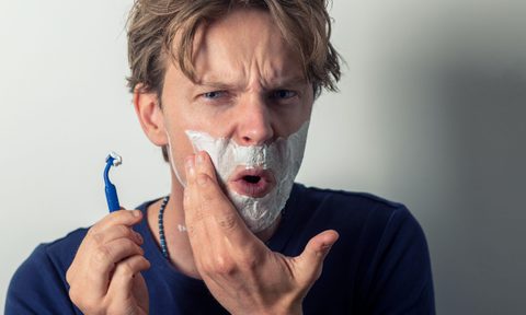 Man shaving with razor burn