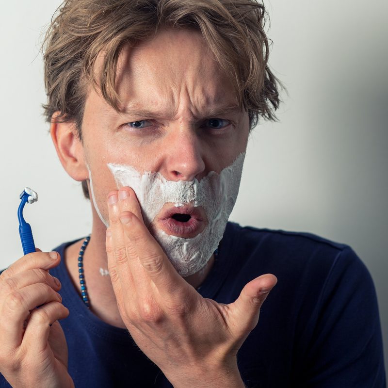 Man shaving with razor burn