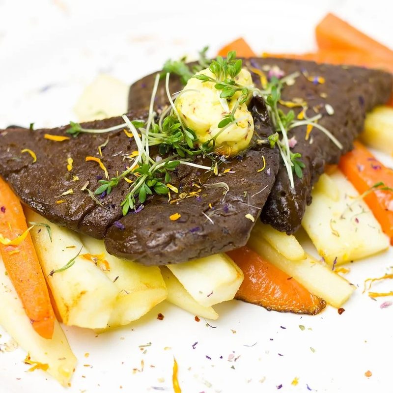 a prepared Seitan dish with carrots.