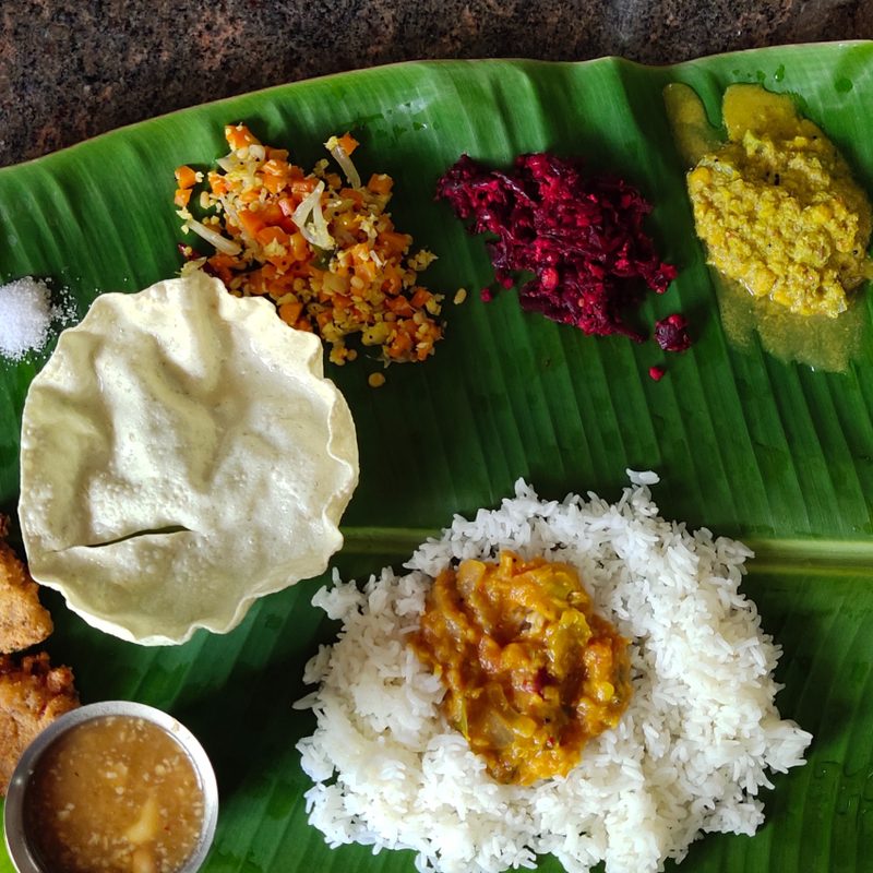 South Indian food on banana leaf.