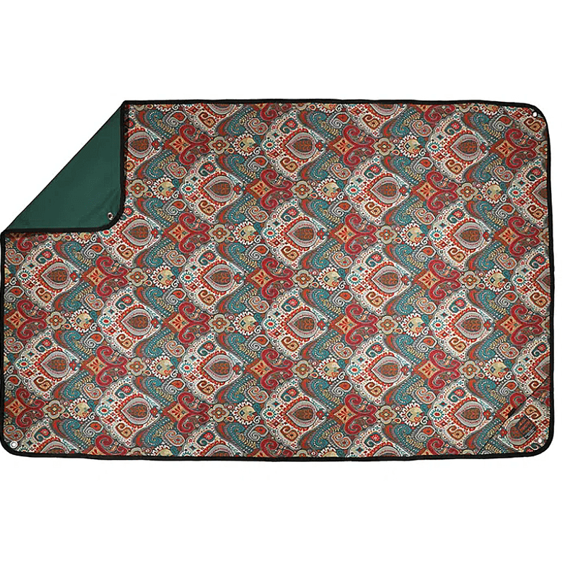A blanket with a Boho-inspired print.