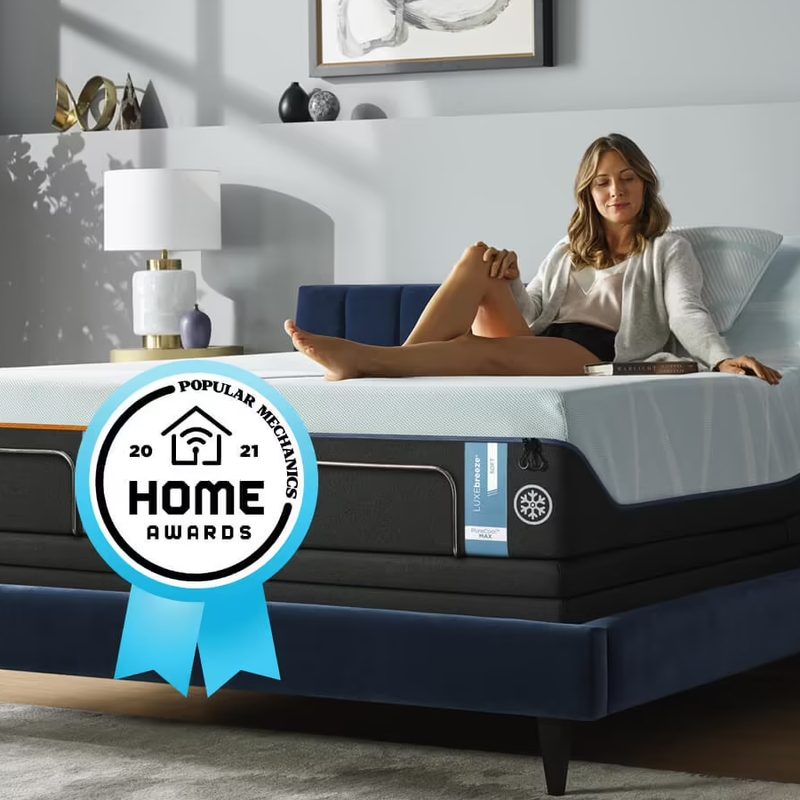 Tempur-Pedic Breeze Mattress with a person on the bed.