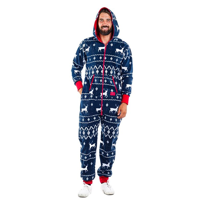 A male model wearing Tipsy Elves Cozy Blue Fair Isle Jumpsuit and white sneakers.