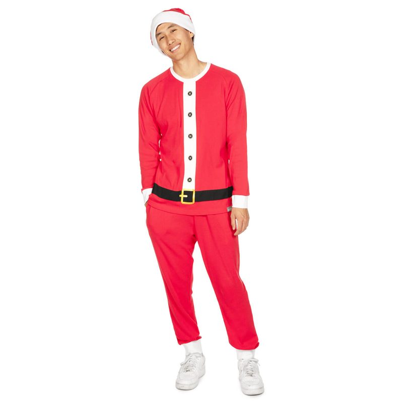 A male model wearing a Santa Claus pajama set from Tipsy Elves.
