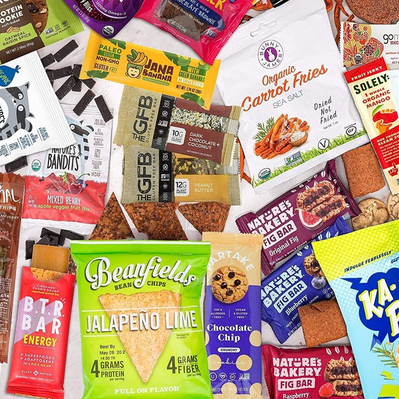 Vegan Gift Boxes snacks in a pile for holidays.