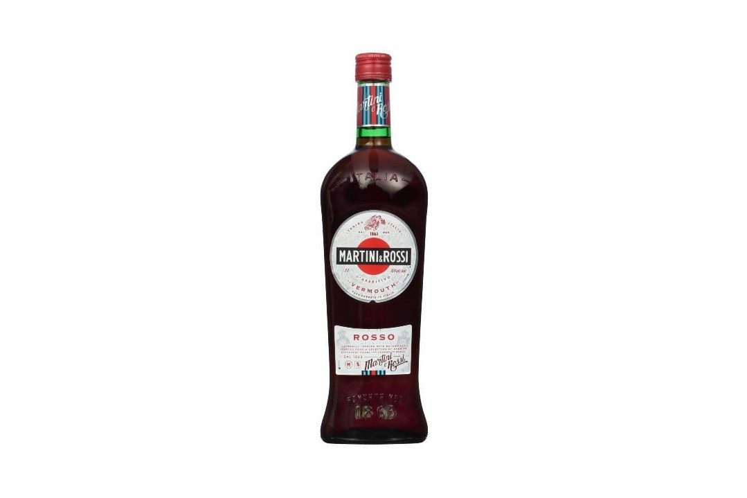 A bottle of Martini 'n Rossi Vermouth on white background.