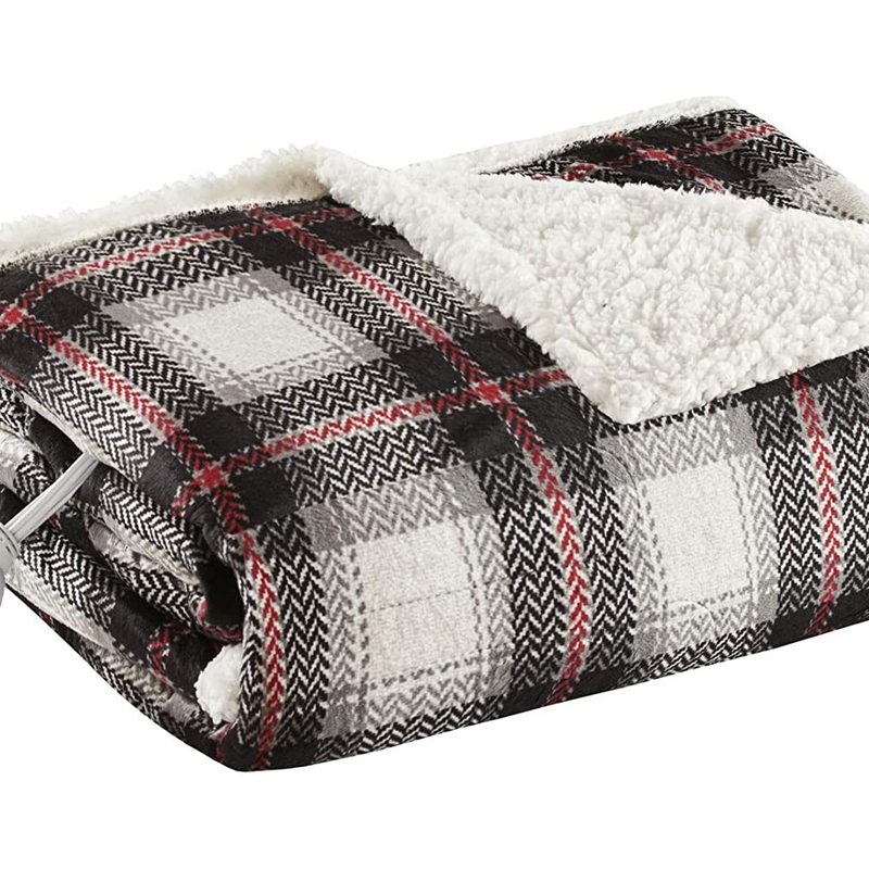 A soft Woolrich Brewster Heated Throw Blanket.