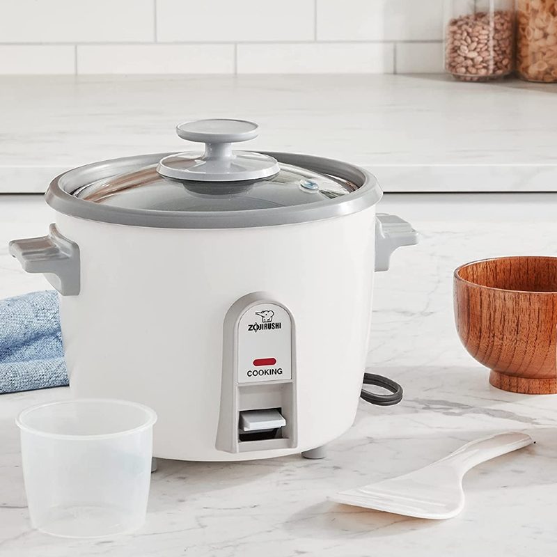Zojirushi NHS-06 3-Cup (Uncooked) Rice Cooker on a kitchen counter.