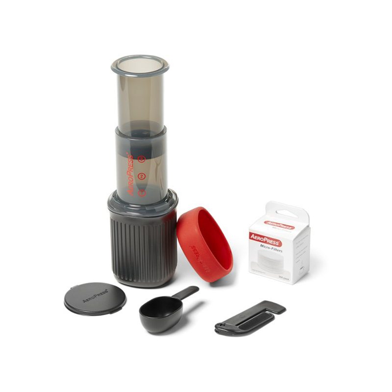 The components of the Aeropress Go Travel Coffee Press on white background.