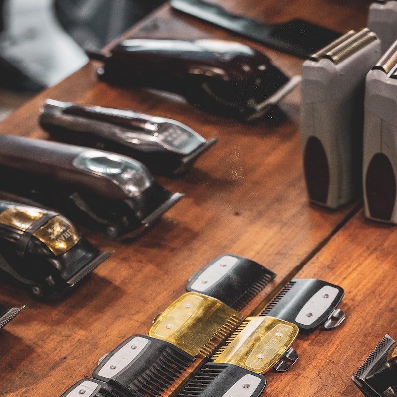 Electric razors pieces lined up.