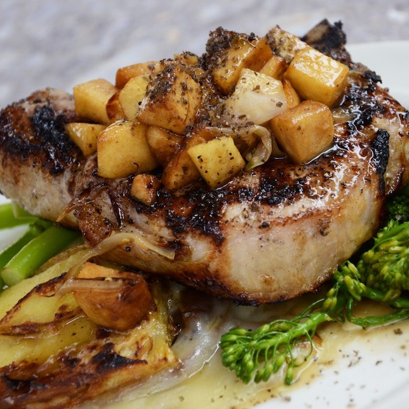 Grilled Pork chops with broccoli rabe.
