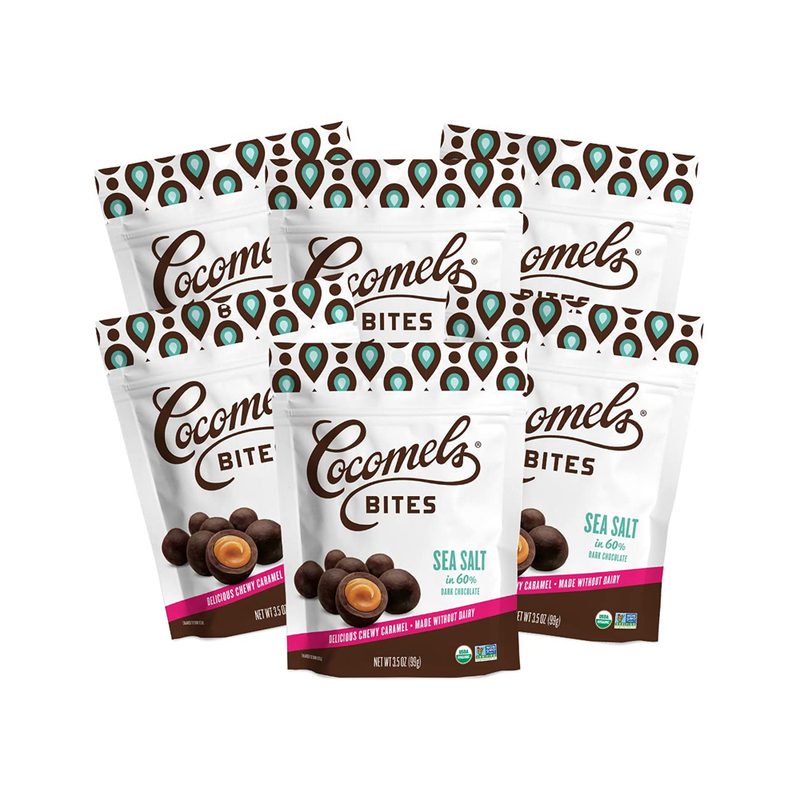 Six packs of Cocomels Chocolate Covered Cocomel Bites on white background.