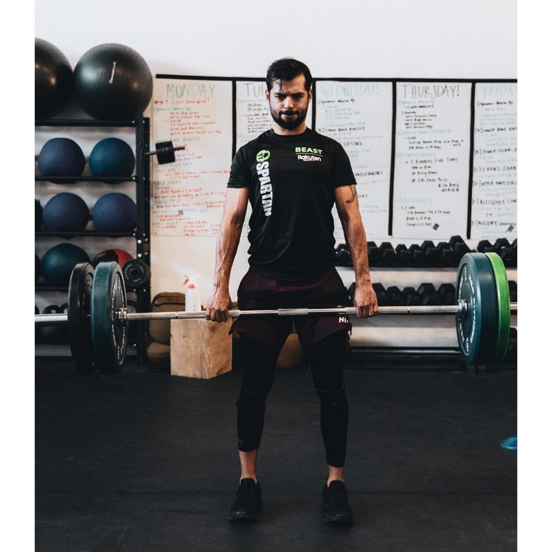 man doing deadlifts.