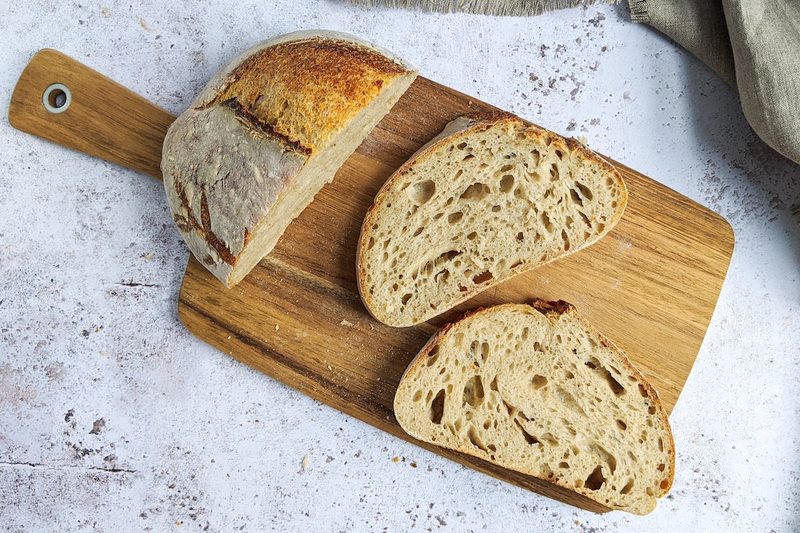 Sliced bread on a cutting board.