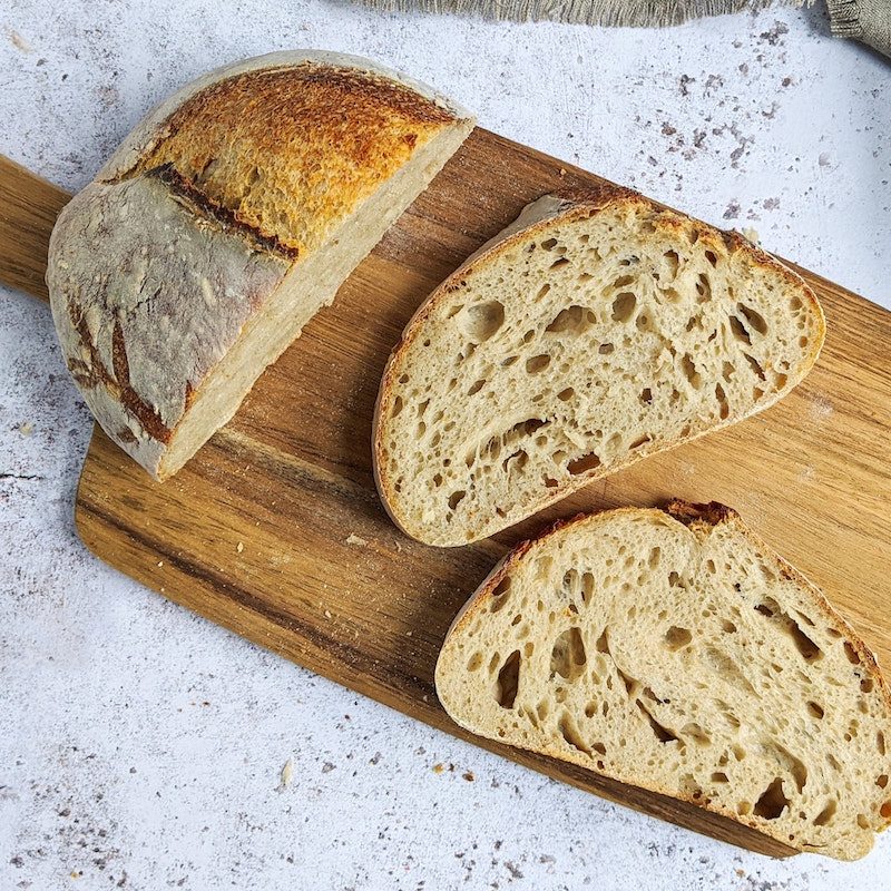Sliced bread on a cutting board.