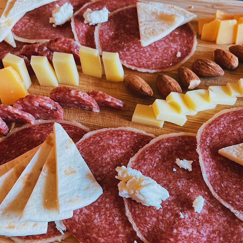 charcuterie board with meats and cheeses.