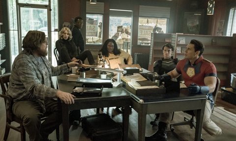 From left to right, Peacemaker's oddball gang: Economos (Steve Agee), Harcourt (Jennifer Holland), Murn (Chukwudi Iwuji), Adebayo (Danielle Brooks, Vigilante (Freddie Stroma), and Peacemaker (John Cena).