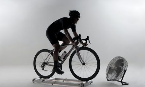 Man riding a bike trainer