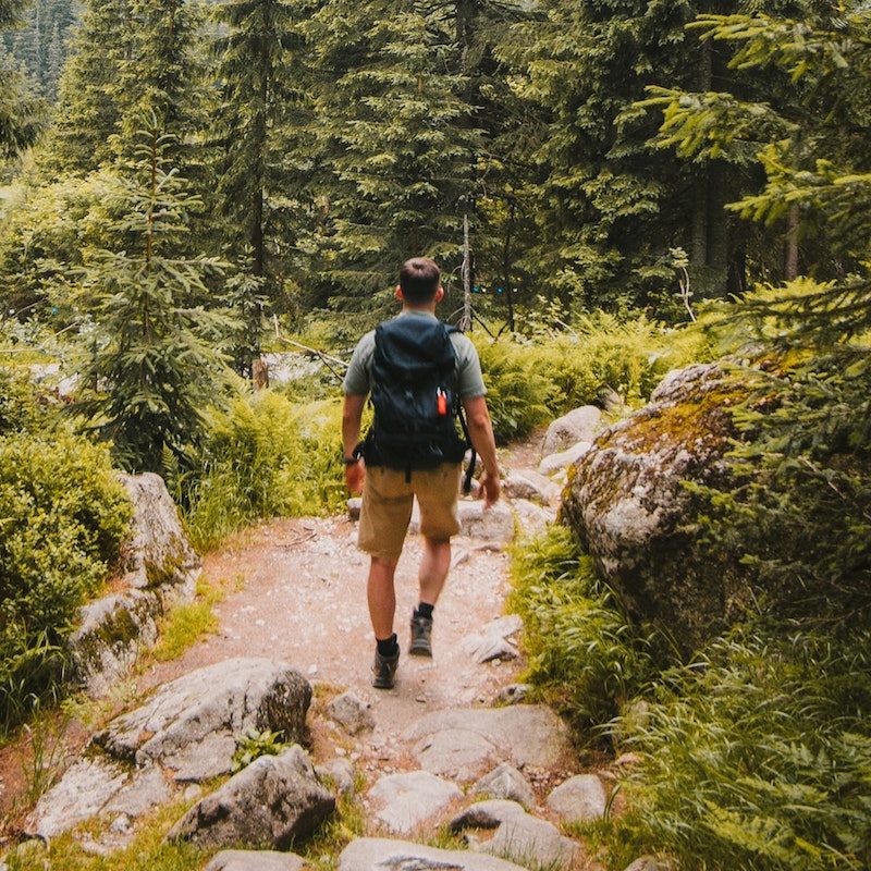 man hiking 10 miles.