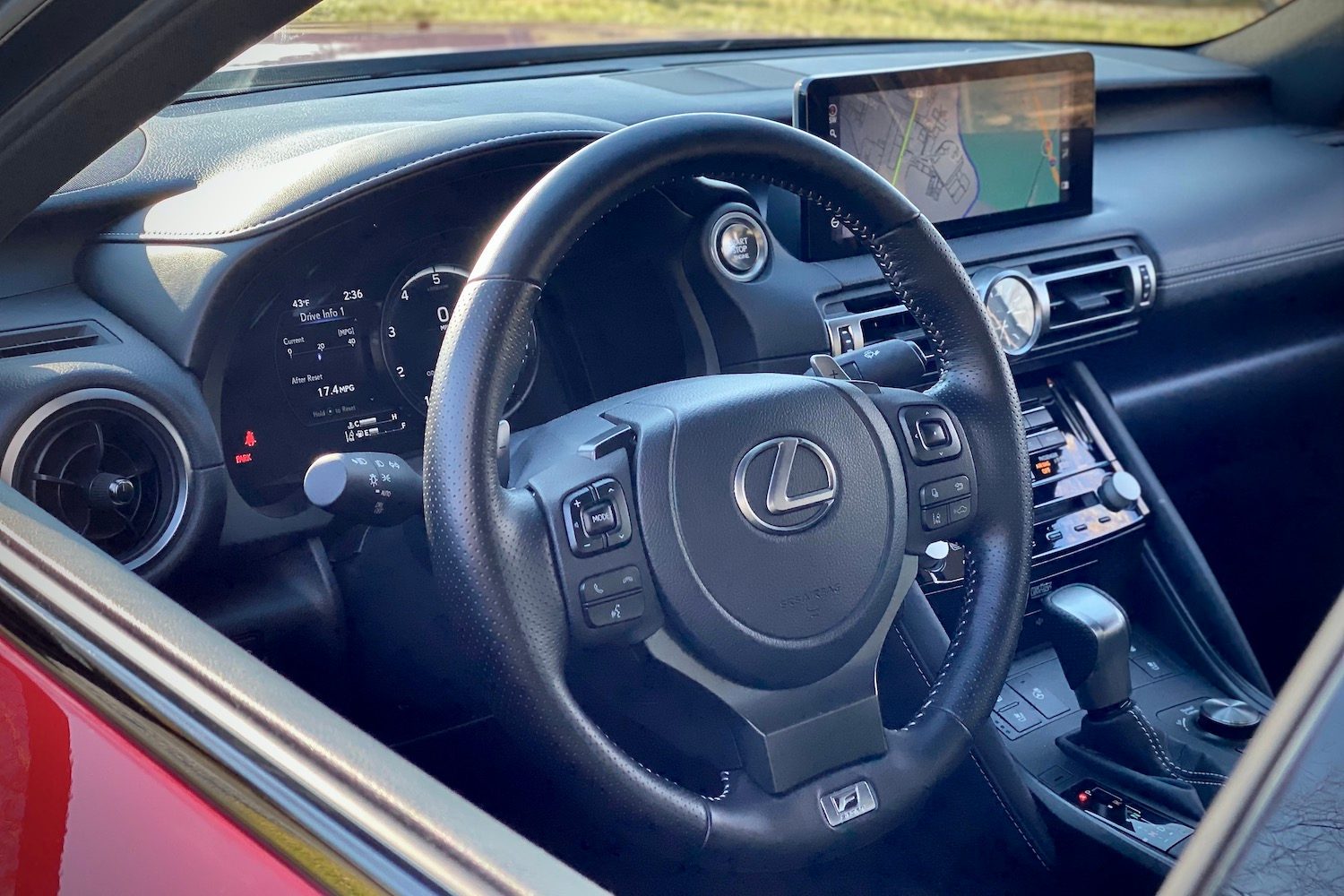 Close up of Lexus IS 500 steering wheel from outside driver's side.