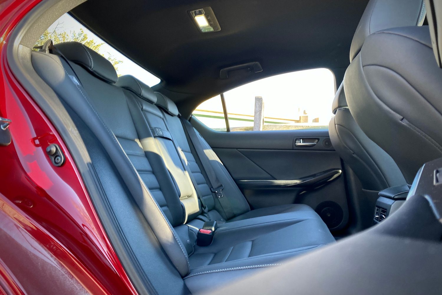 Side view of rear seats in Lexus IS 500 from passenger's side.