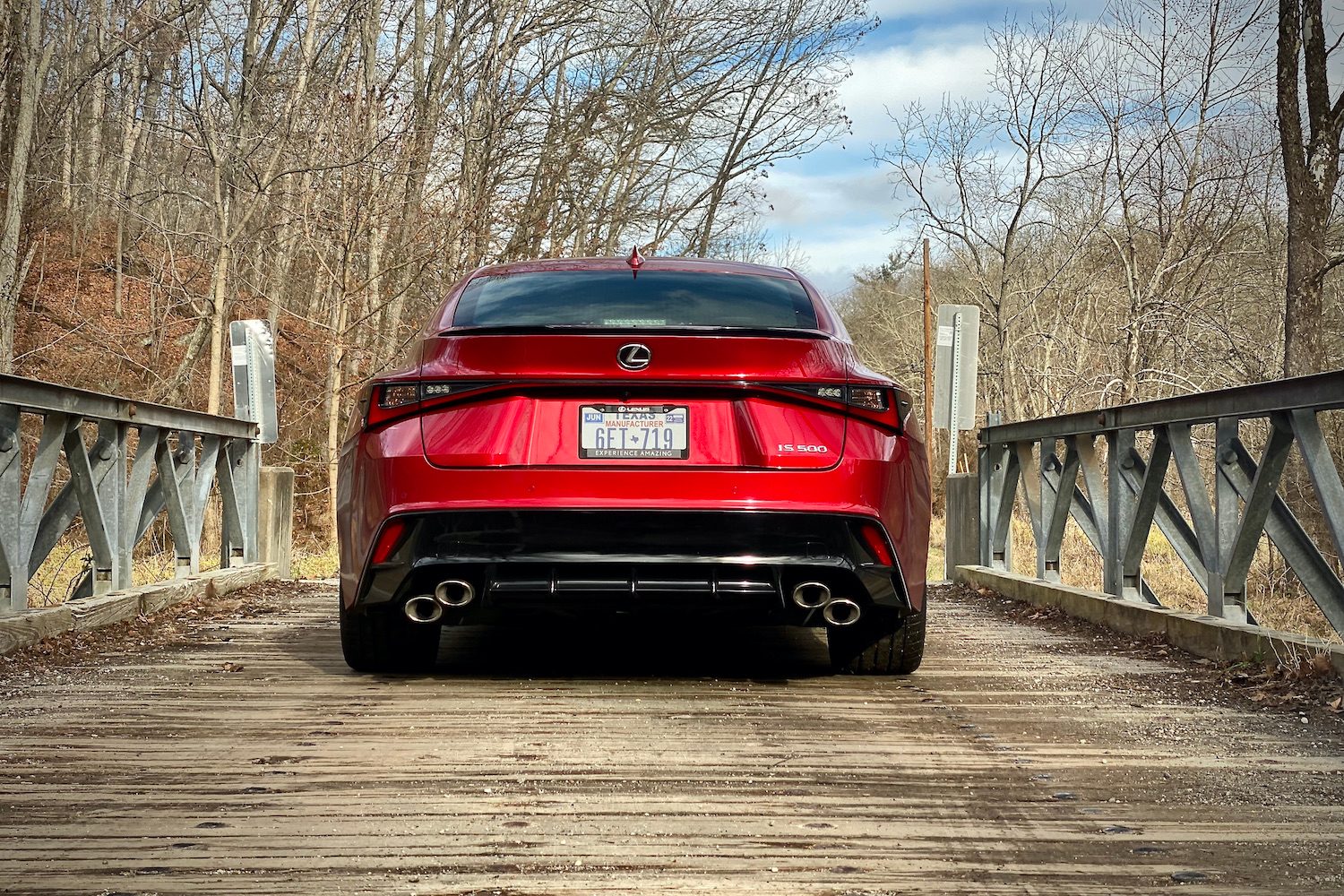 Lexus IS 500 rear end on a bridge.