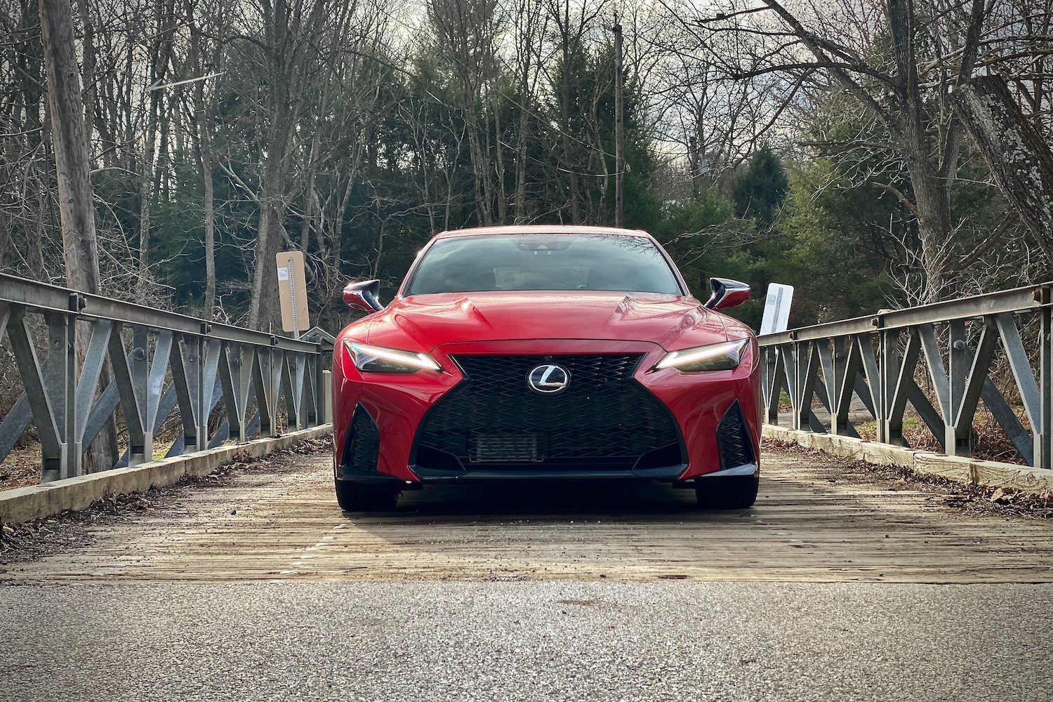 Lexus IS 500 front end on a bridge.