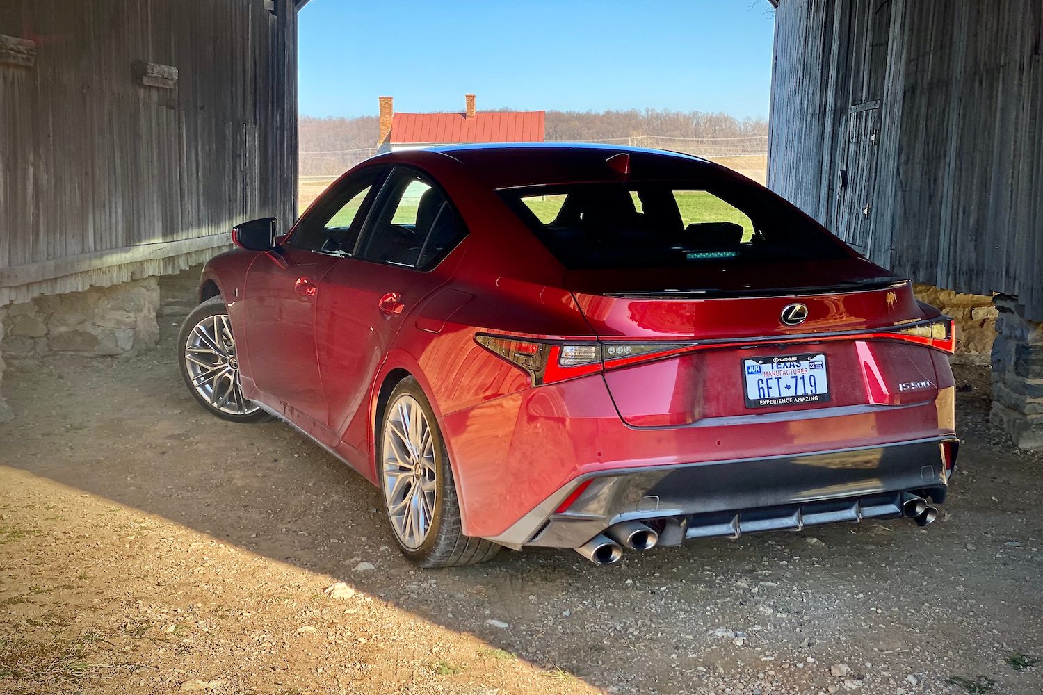 Lexus IS 500 rear end from driver's side angle in a barn.