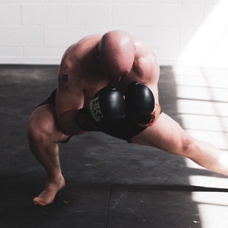 Man doing a side lunge