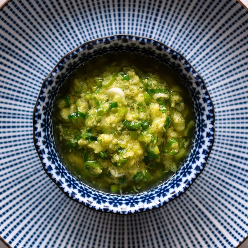 Bowl of Nom Nom Ginger Scallion sauce.