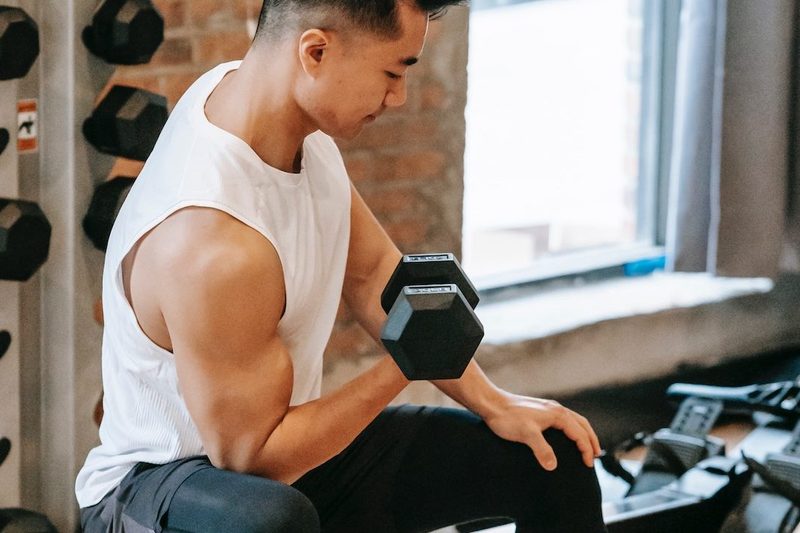 Man doing curls.