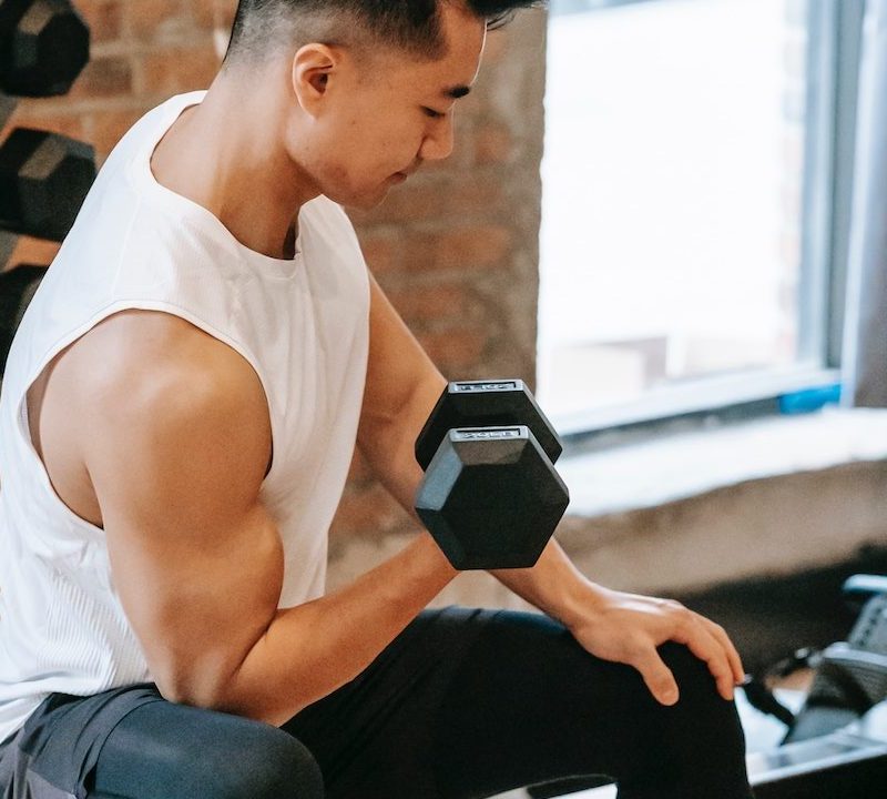man doing curls.