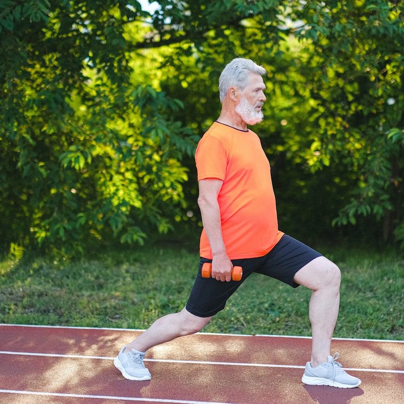 man doing hip lunge.