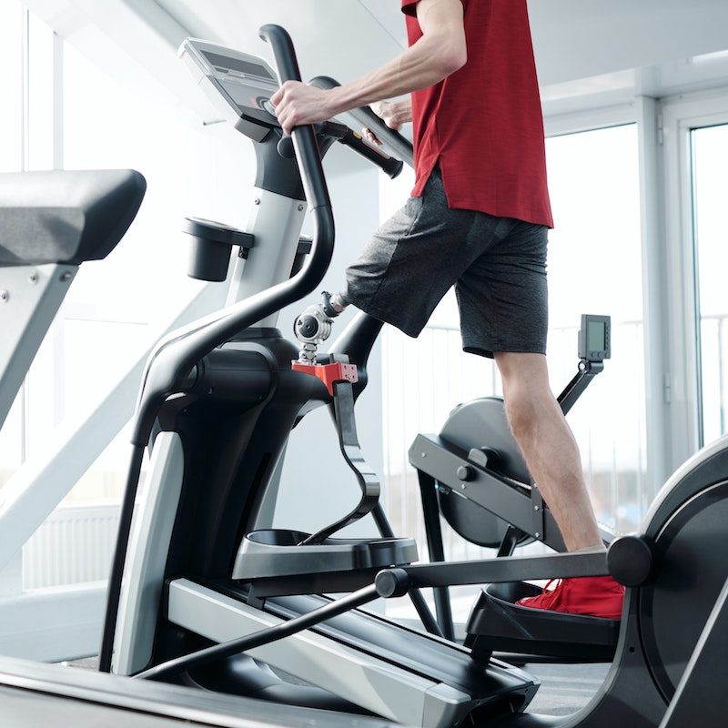 Man doing elliptical.