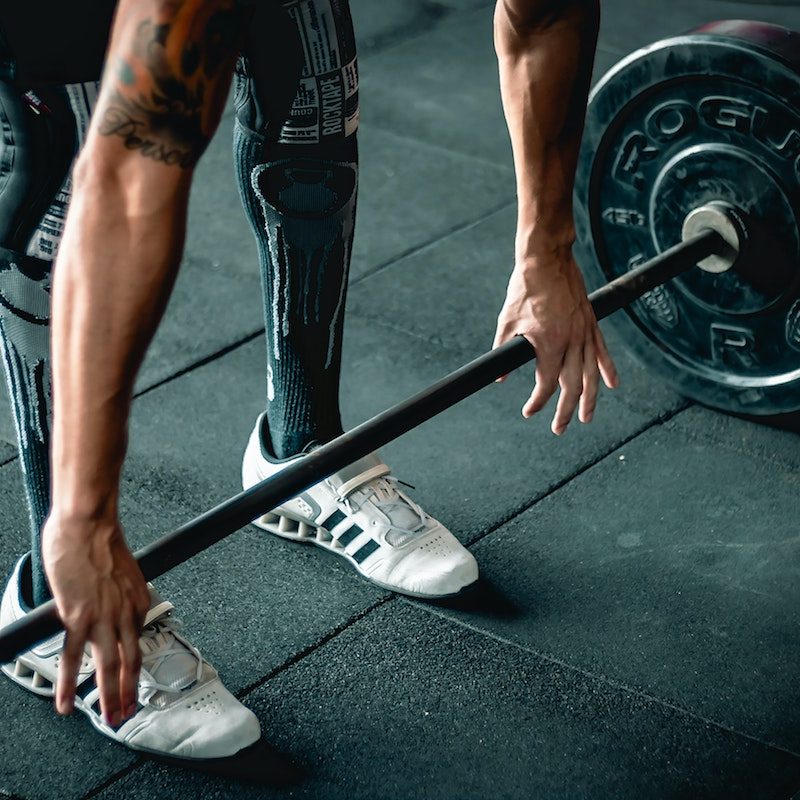 Man doing deadlifts