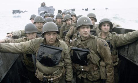 Tom Hanks, Tom Sizemore, and other actors playing as American soldiers riding a boat in "Saving Private Ryan."