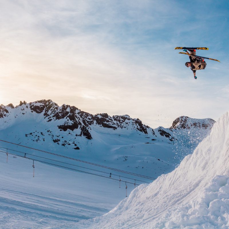 Skier doing a flip in the air.