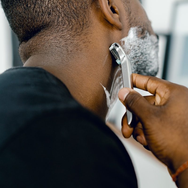Man shaving against the grain.