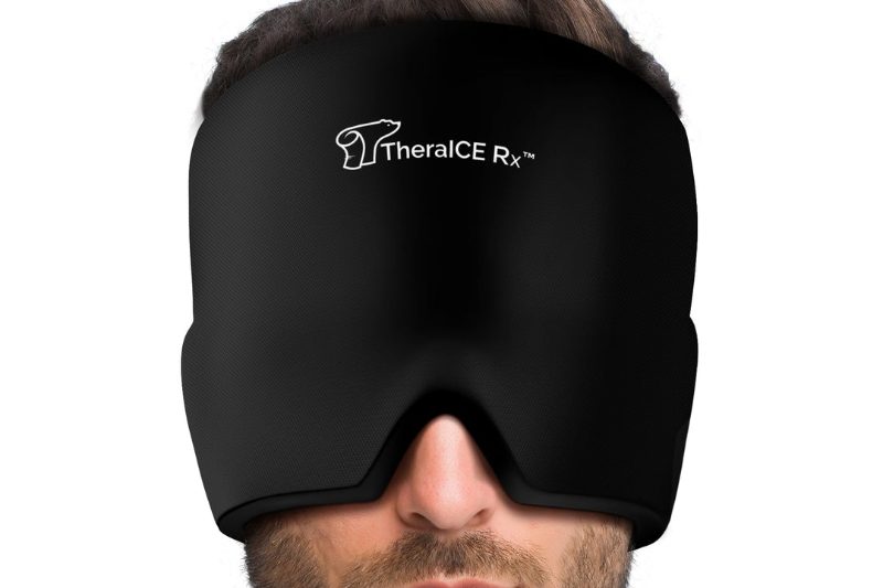 man wearing a Headache relieving mask.