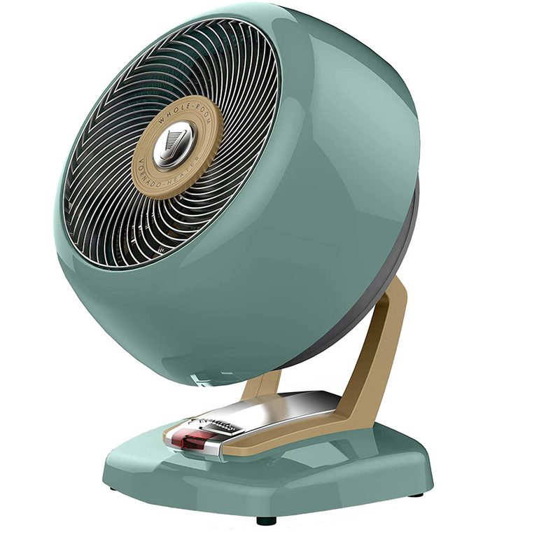 A teal Vornado VHEAT Vintage Metal Heater on plain background.