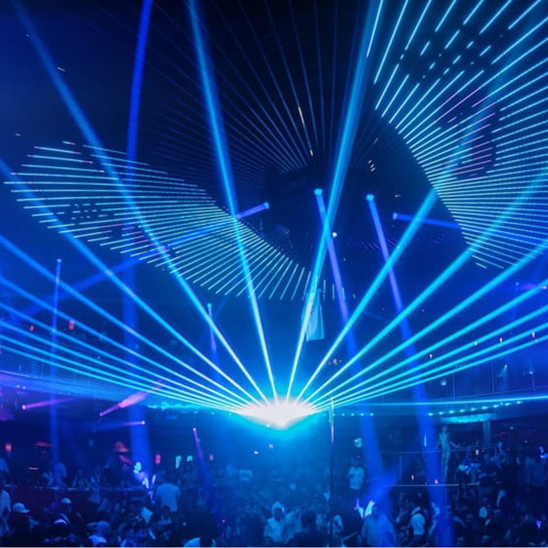 Blue lights illuminate interior dance floor