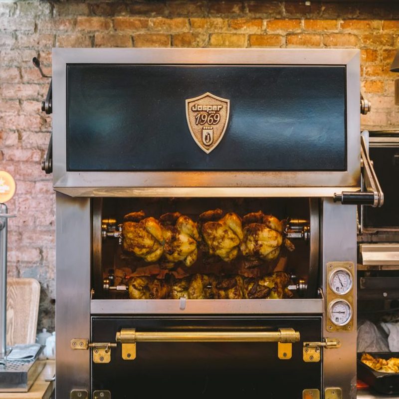 Rotisserie chickens in oven