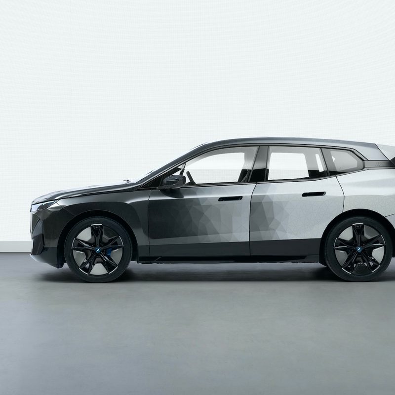 BMW iX Flow Featuring E_Ink concept side profile with front black and back white.