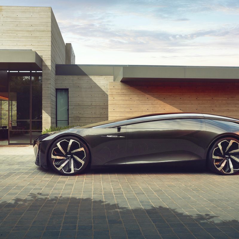 Cadillac InnerSpace Concept side profile in front of a modern house.