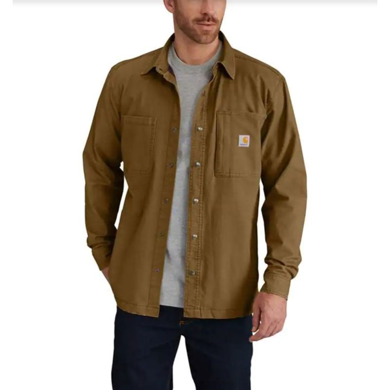 Male model wearing a Carhartt Rugged Flex Fleece-Lined Snap-Front Shirt Jac.