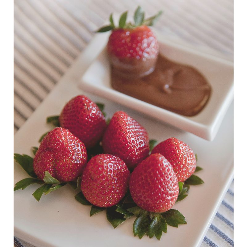 Chocolate Covered Strawberries on a white serving tray.