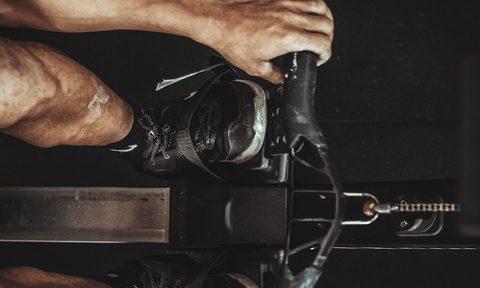 Man using rowing machine for fitness