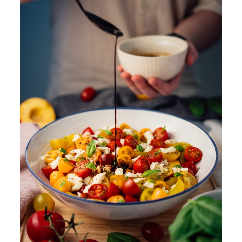 Salad dressing opured over veggies